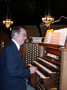 Composer Robert J Powell at Christ Churchs organ console